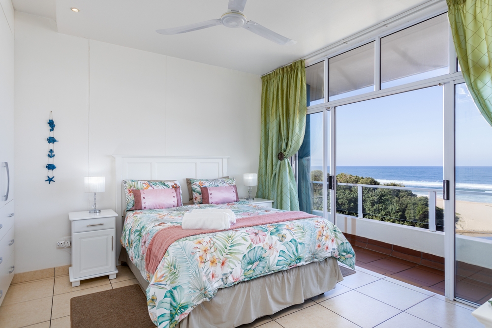 Colonial Sands 403: Colonial Sands 403
Main Bedroom opening up onto the balcony.